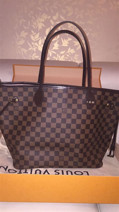 louis vuitton bag with initials.